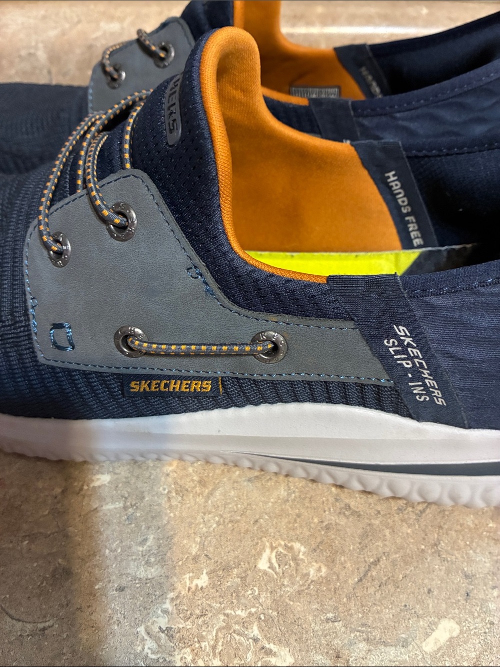 Skechers Men's Size 12 Navy Knit Slip-On Sneakers with Orange Liner - Picture 3 of 11